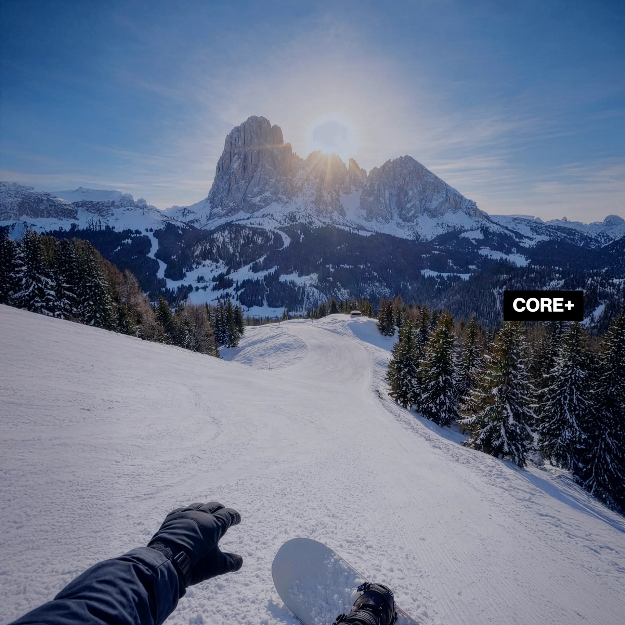 Snowboarding view through LosReyes CORE+ snow goggles, showing reduced glare and improved clarity on a snowy mountain slope.