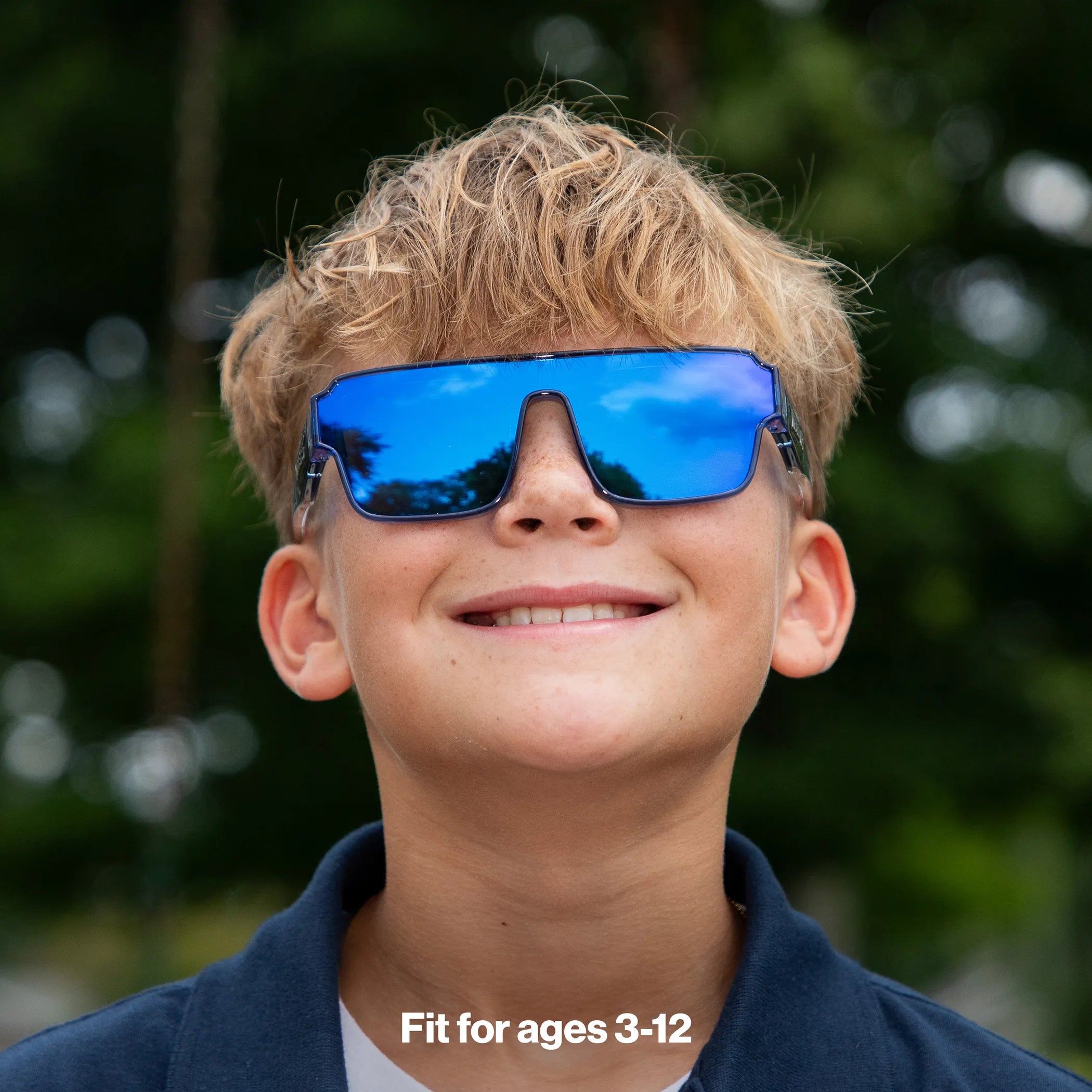 Child wearing LosReyes youth Superhero shield sunglasses in blue with blue mirrored lens, fit for ages 3-12