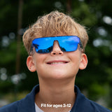 Child wearing LosReyes youth Superhero shield sunglasses in blue with blue mirrored lens, fit for ages 3-12