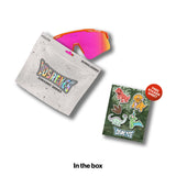 LosReyes Youth Jurassic Series Triceratops sunglasses with an orange frame fading to pink rubber tips and a pink mirror lens, shown with a resealable YOUTH pouch and a free dinosaur sticker sheet