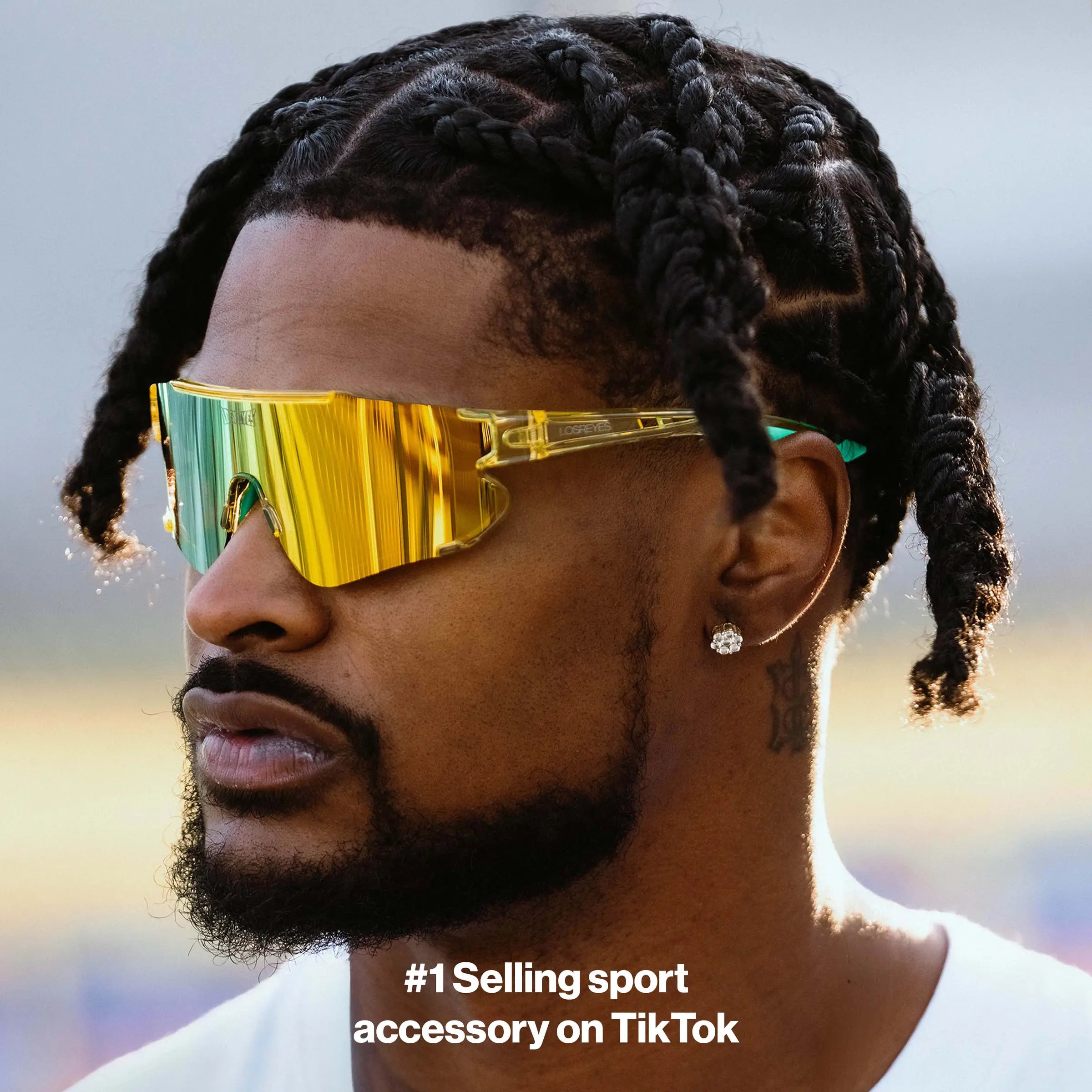 Former football athlete Ross500 wearing Elevate Lime LosReyes running sunglasses engineered with polarized UV400 lenses and flexible TR90 for endurance and performance.