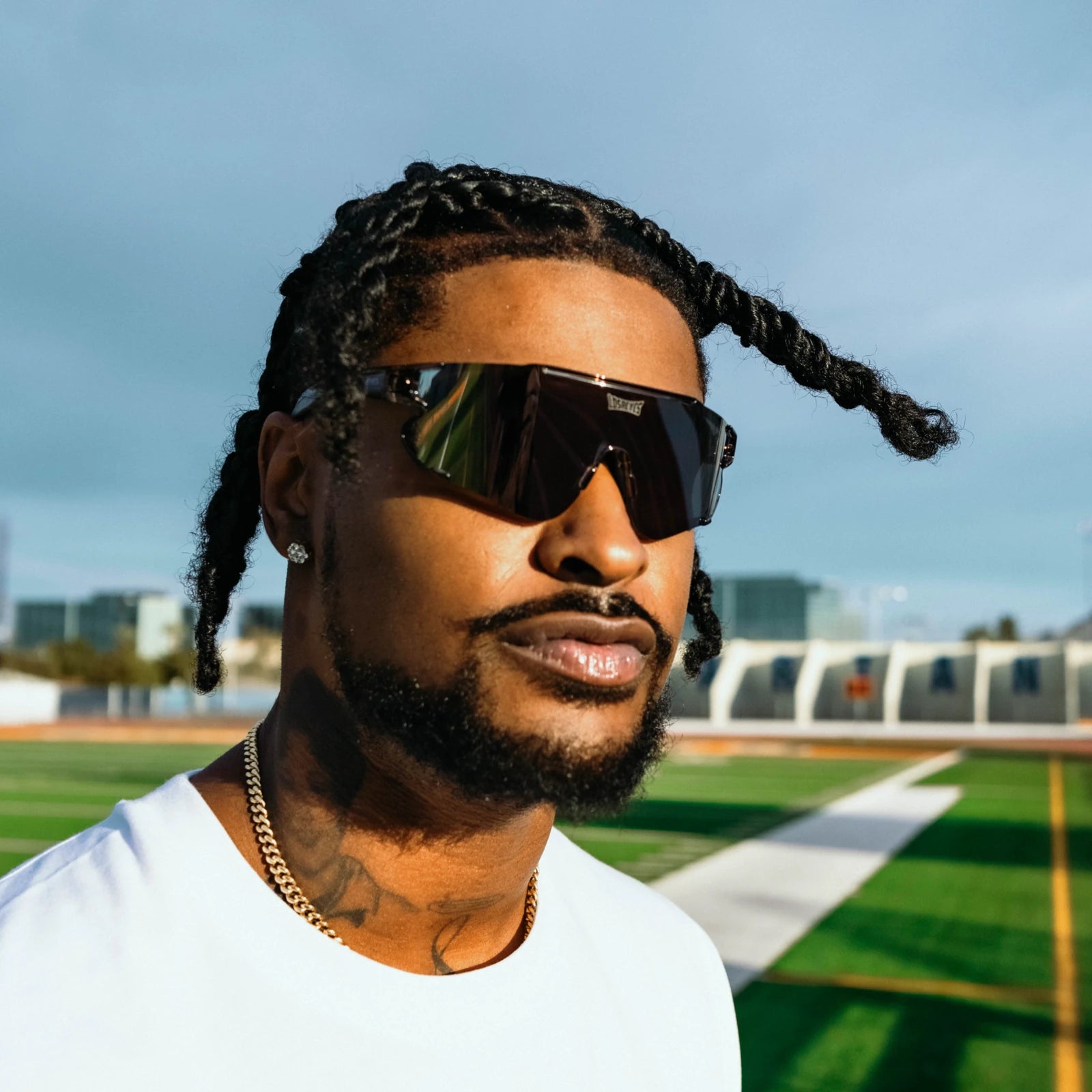 Ross500 modeling Elevate marshmallow LosReyes training sunglasses with UV400 polarized protection, built for gym sessions, speed drills, and outdoor workouts.