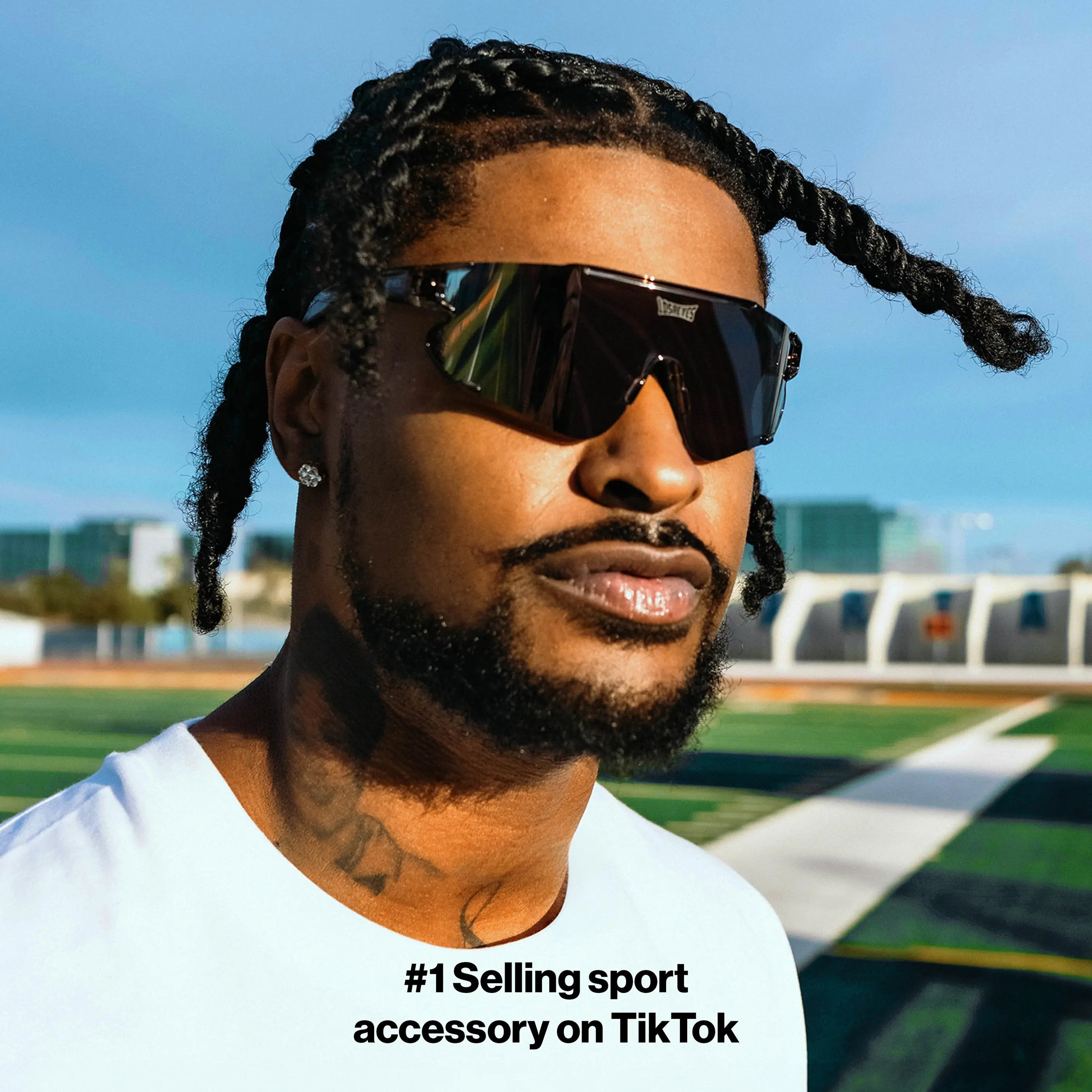Ross500 modeling Elevate marshmallow LosReyes training sunglasses with UV400 polarized protection, built for gym sessions, speed drills, and outdoor workouts.