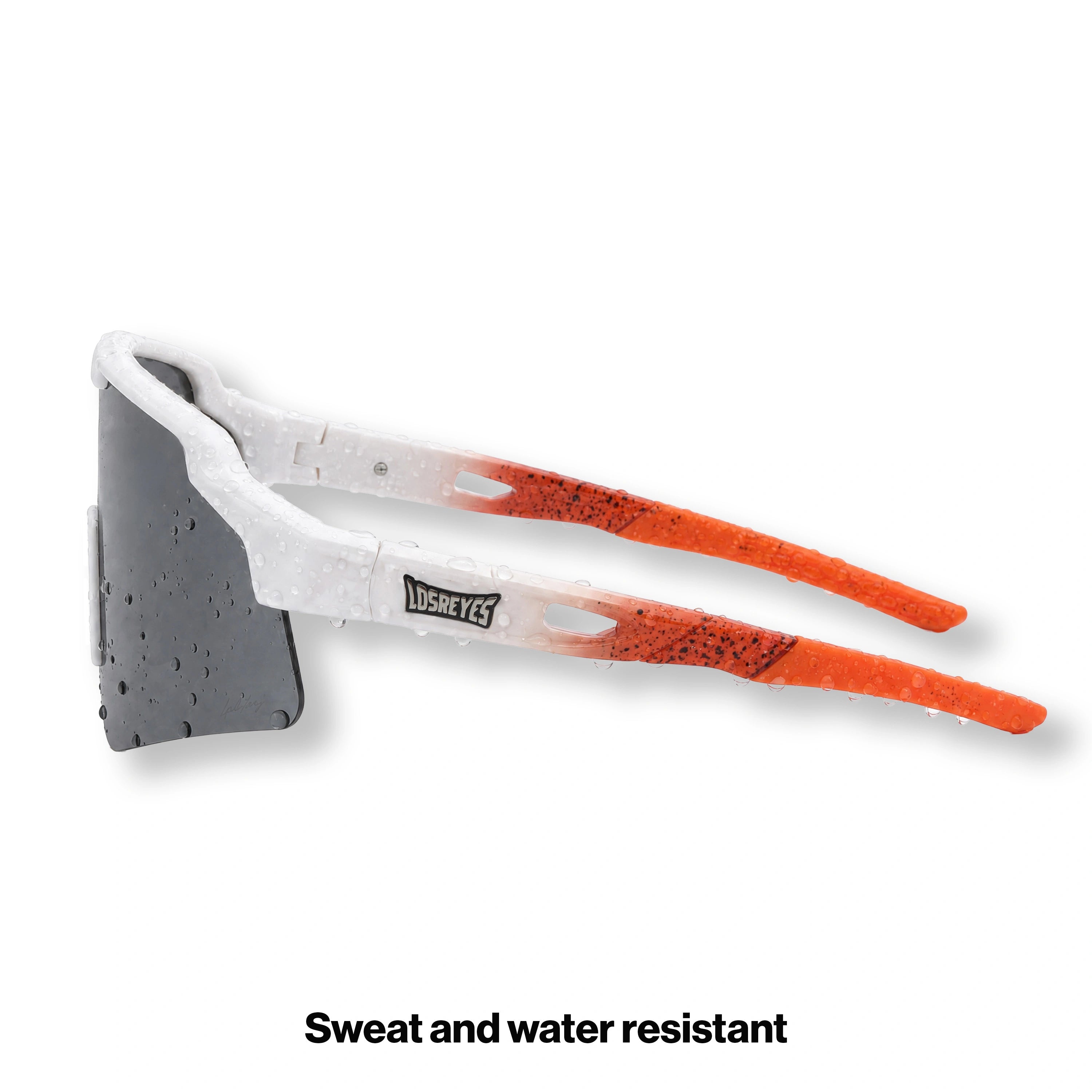 Side view of SHOWTIME Hurricane reversed sunglasses with white frame and orange splatter temples
