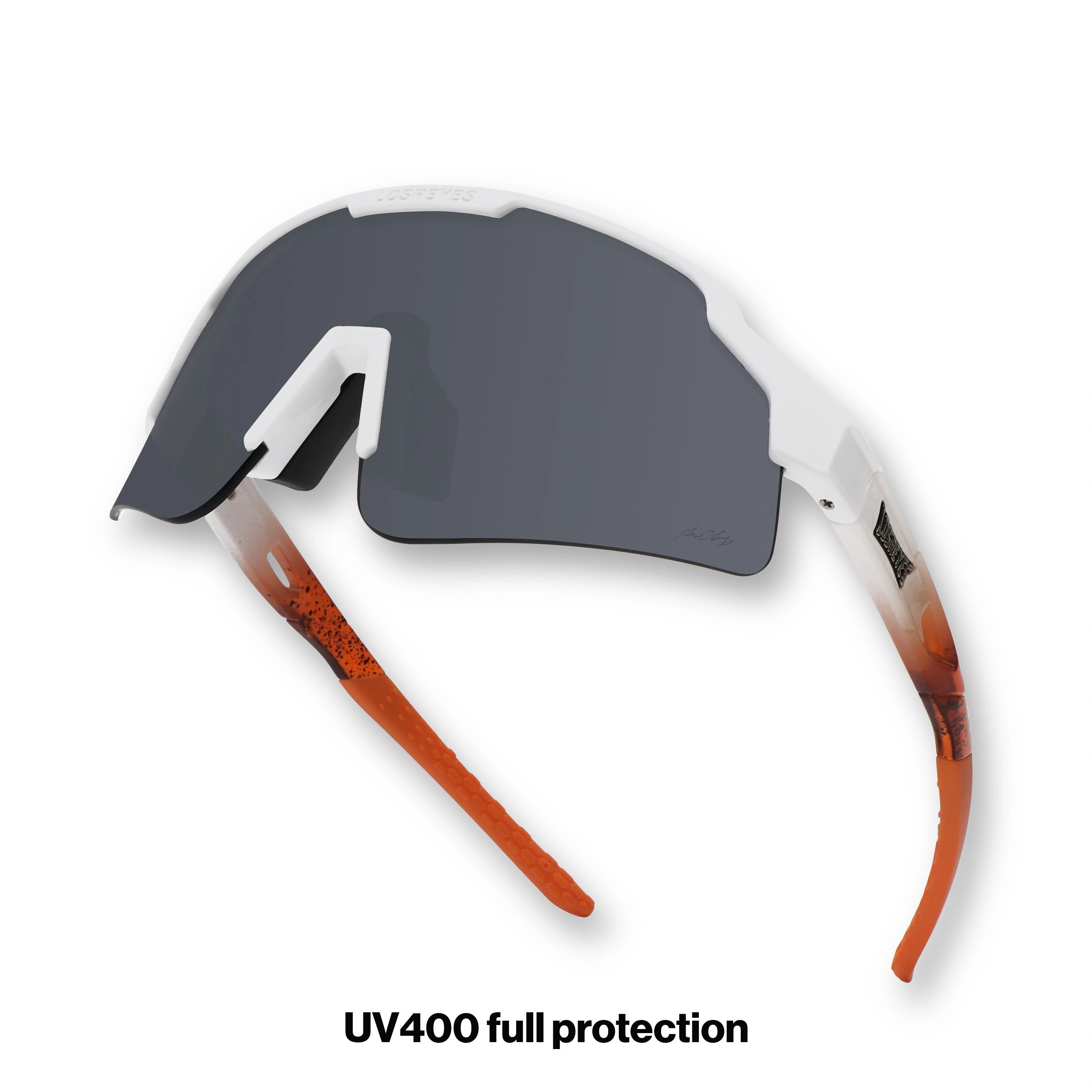 Side angle of SHOWTIME Hurricane reversed sunglasses showcasing semi-rimless blade lens and orange temples