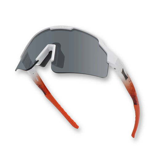 Side angle of SHOWTIME Hurricane reversed sunglasses showcasing semi-rimless blade lens and orange temples
